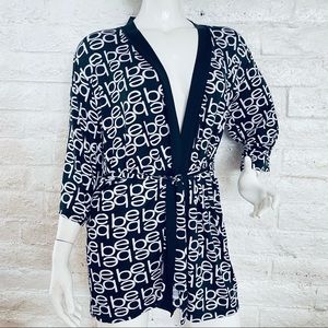 bebe   pajama robe size M

  Baby pajamas robe robe black polyester
  Bebe